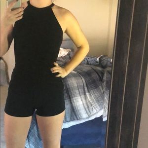 Black form fitting romper